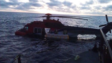 The Super Puma EC225 floating in the sea off Fair Isle - Photos: RNLI