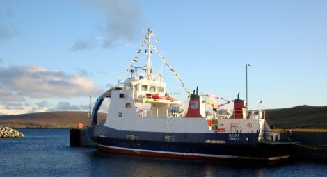 The ferry Geira festooned with flags for Saturday's opening ceremony, but will it be allowed to stay? Pic. Fetlar Developments Ltd