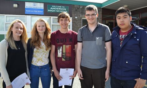 High achievers: Megan Petursdottir (16) and Kirsty Uttley (17) both got five 'A's at higher level. Charlie Unsworth (16) received seven '1's and a '2' at standard grade level. James Ma (18) received three 'A's and a 'C' at Advanced Higher and Ross Jamieson (17) received four 'A's at advanced higher – Photo: BBC