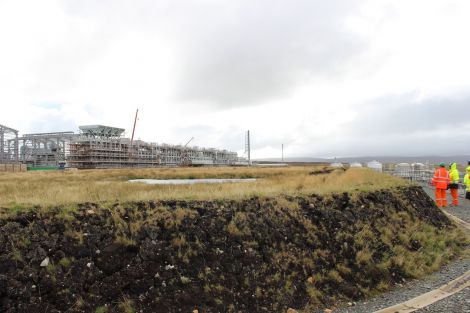 One of two peat stores that will hold 650,000 cubic metres of peat until the site closes and is reinstated, which will not be for more than three decades. Photo Pete Bevington/ShetNews
