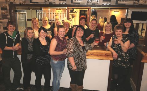 The Mid Brae Inn staff raise a glass to congratulate owner Diane Davies (second from right) on the re-opening of the restaurant - Photo: Gordon Stove
