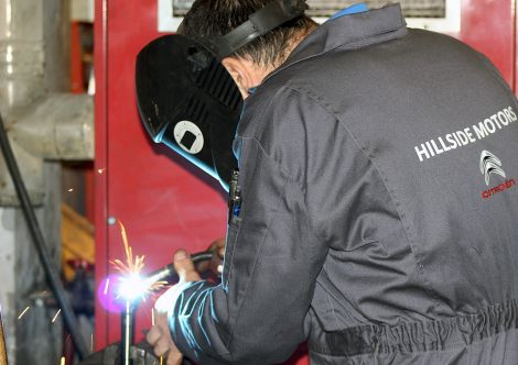  Experienced mechanic John Stanley demonstrates his wealth of ability with welding repairs to a Suzuki.
