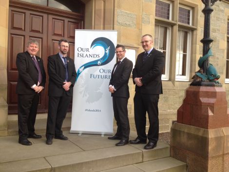 Pictured outside Lerwick Town Hall following the latest meeting with Scottish ministers to discuss further autonomy for the islands are (left to right): Western Isles leader Angus Campbell, Orkney leader Steven Heddle, Scottish planning minister Derek Mackay and SIC leader Gary Robinson. Photo: Shetnews/Neil Riddell