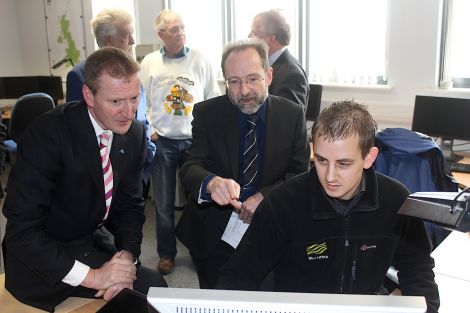 Shetland MSP Tavish Scott, the Met Office's chief government adviser for Scotland and Northern Ireland, Alex Hill, and radiosonde operator Owen Barton monitoring the data transmitted from the weather balloon launched earlier in the day - Photo: Hans J Marter/ShetNews