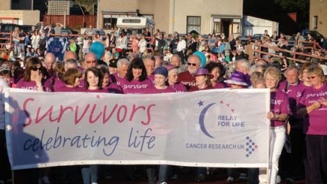 In 2012 the Relay for Life was blessed with glorious sunshine as 130 cancer survivors started the even with their lap of honour. Photo Hans J Marter