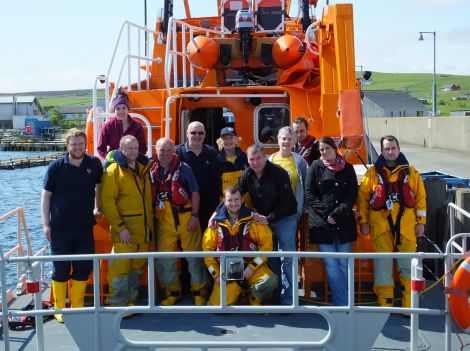 Jan Livingstone joins the Aith lifeboat crew to complete one of her 70 challenges on Tuesday.
