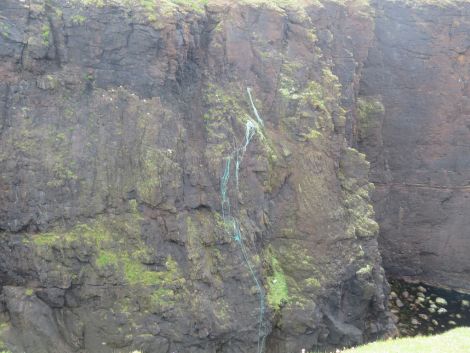 The entire mass of rope and netting hanging off the southern cliff at Calders Geo.