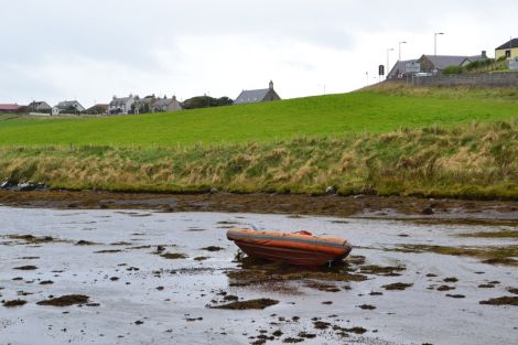 A small boat was abandoned in the water at East Voe on Tuesday afternoon. Photo: Shetnews