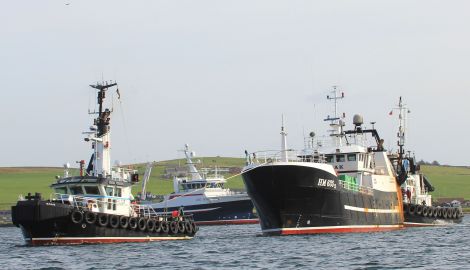Danish trawler Karbak being towed into Lerwick on Sunday. Photo: Ian Leask