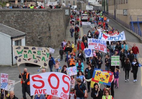 Protesters marching through Lerwick last June in support of the islands rural schools.