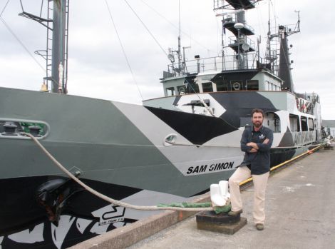 Skipper Lockhart MacLean beside Sea Shepherd's anti-whaling ship Sam Simon in Lerwick harbour ahead of their mission to stop the Faroe grind. Photo Yetti Biscuit
