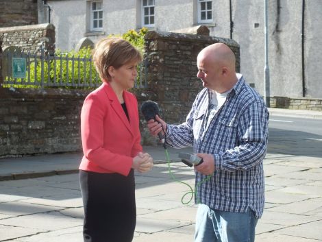 First Minister Nicola Sturgeon being interviewed by BBC Radio Orkney's reporter Dave Gray in Kirkwall on Monday.