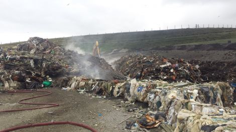 Burning bruck - the Lerwick landfill site still smoking on Thursday from the underground fire.