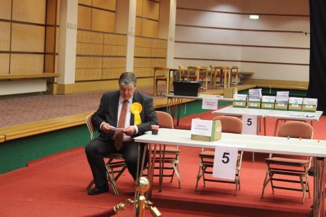 Northern Isles MP Alistair Carmichael checking ballots at the May election count. Photo: Shetnews