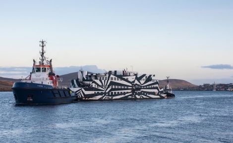 Sans Vitesse being towed out of Lerwick harbour on Thursday evening by the council's Sullom Voe tug Tystie. Photo Platform Shetland