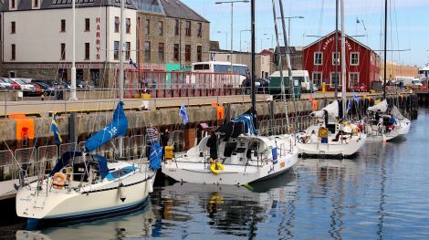 Yachts competing in the annual Shetland Race beginning to line up at Lerwick harbour. Photo: Chris Cope/Shetnews