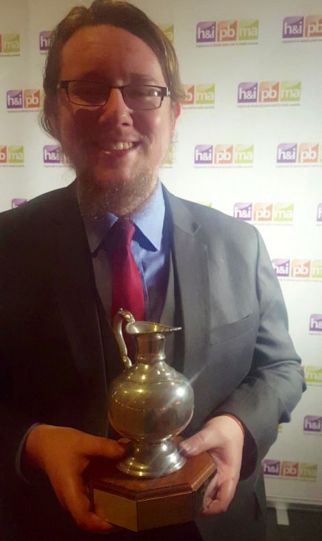 BBC Radio Shetland's Daniel Lawson with his Young Journalist of the Year award. Photo: Laura McIntyre
