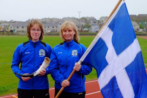 Unst-based track athlete Faye Cox (left) will be the water carrier, and racquet sportswoman Joan Smith will be the flag bearer for Team Shetland in Gotland next month. Photo: Shetland Island Games Association.
