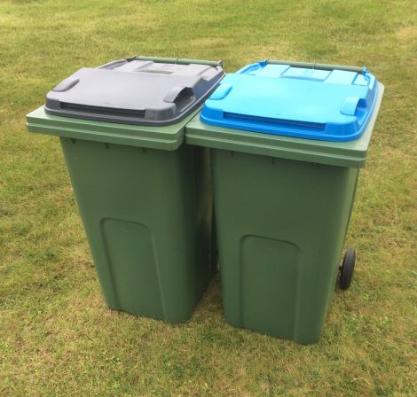 An example of the bins that will be distributed to households before recycling collections begin next year. Bins will be stickered and lids will be different colours for different categories of waste. Photo: SIC