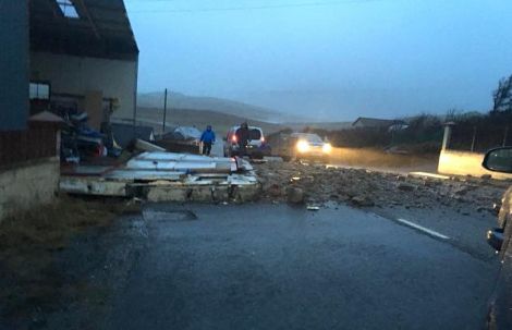 The road into Urafirth was blocked on Thursday afternoon after a building suffered structural damage. Photo: Cat Duncan