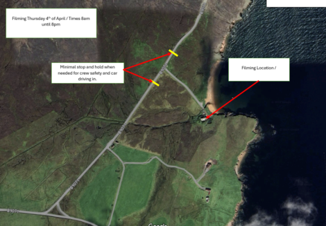 Aerial map indicating a filming location with access routes and traffic control points.